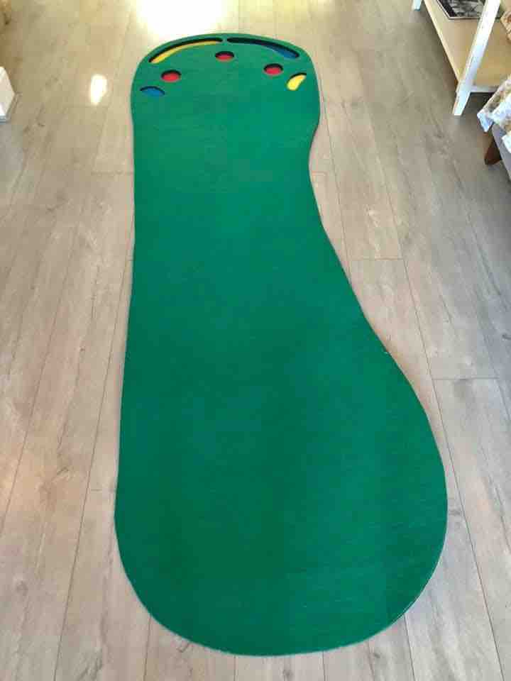 Golf putting mat is 3 metres and cost about £50-60