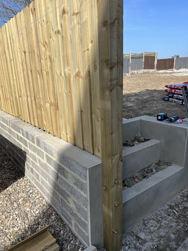 How To Install A Wood Fence Above A Wall - Youtube