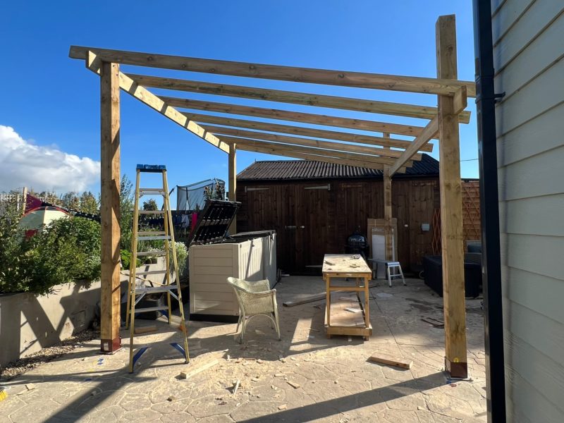 How to make a heavy duty wooden pergola that can support solar panels on a concrete base from scratch – complete walkthrough